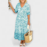 Caitlin - Robe fleurie gracieuse avec un design aérien