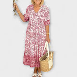 Caitlin - Robe fleurie gracieuse avec un design aérien